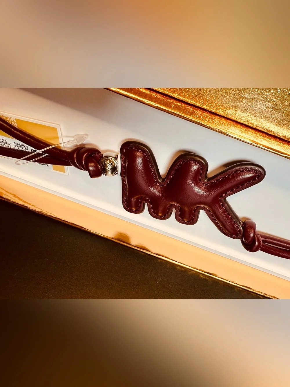 Michael Kors Oxblood Puffy Leather MK Logo Bag Charm Charm Silver Hardware NIB